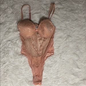 Pink bodysuit. Never worn!!